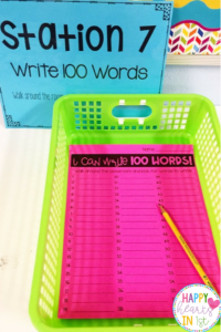 Students write 100 words to celebrate the 100th Day of School stations