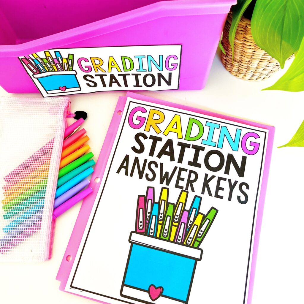 Save time by incorporating a Grading Station into your math center routine in your elementary classroom! When students complete a math center with a recording page, they can take finished work to the grading station. They get to be the “teacher” and check their own work! This is a huge time-saver for me and also helps my students to be accountable! Read more to learn about how I set-up my Grading Station Tub for math centers, how I use this as assessment, and grab the grading station freebie! 