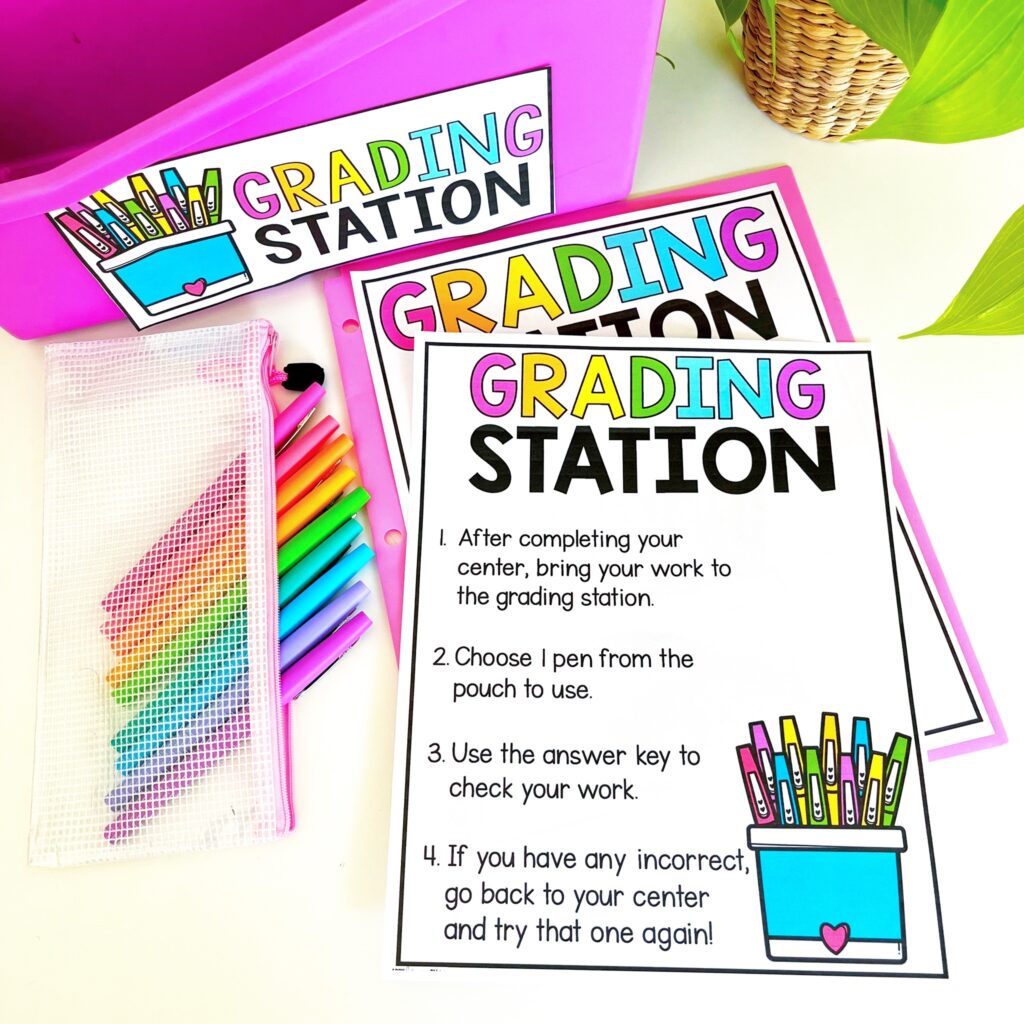 Save time by incorporating a Grading Station into your math center routine in your elementary classroom! When students complete a math center with a recording page, they can take finished work to the grading station. They get to be the “teacher” and check their own work! This is a huge time-saver for me and also helps my students to be accountable! Read more to learn about how I set-up my Grading Station Tub for math centers, how I use this as assessment, and grab the grading station freebie! 